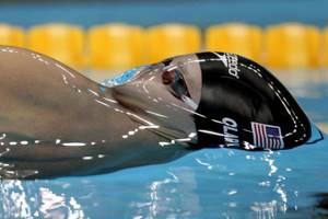 20 фотографий, на которые смотришь и глазам не веришь, Пловец на чемпионате по плаванию на короткие дистанции
